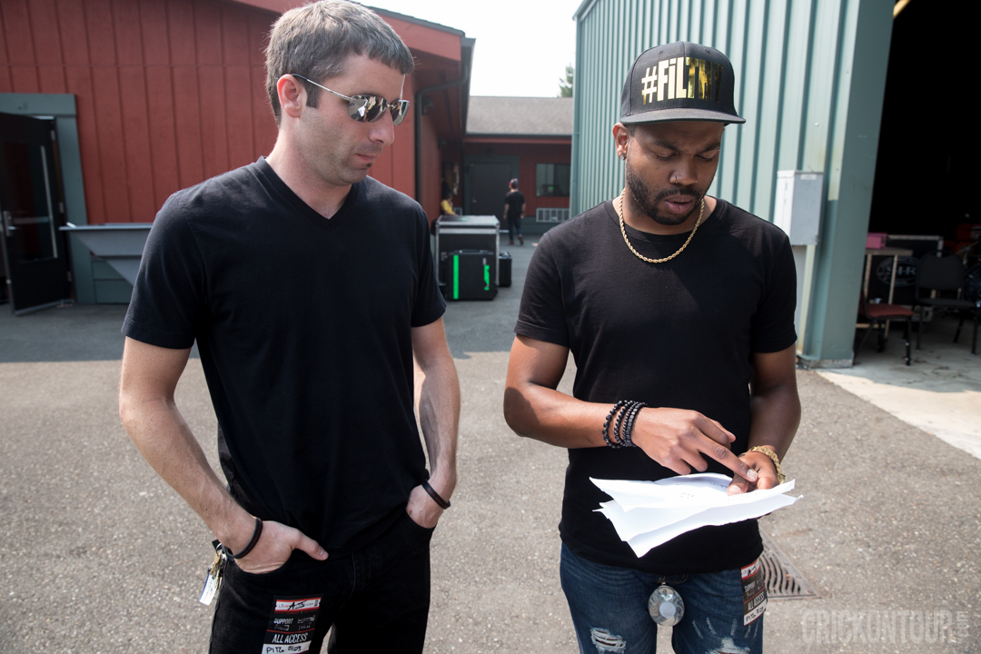 Mackenzie McAninch and Ayron Jones reviewing the setlist before taking the stage at KISW's Pain in the Grass. (Photo: Alex Crick)