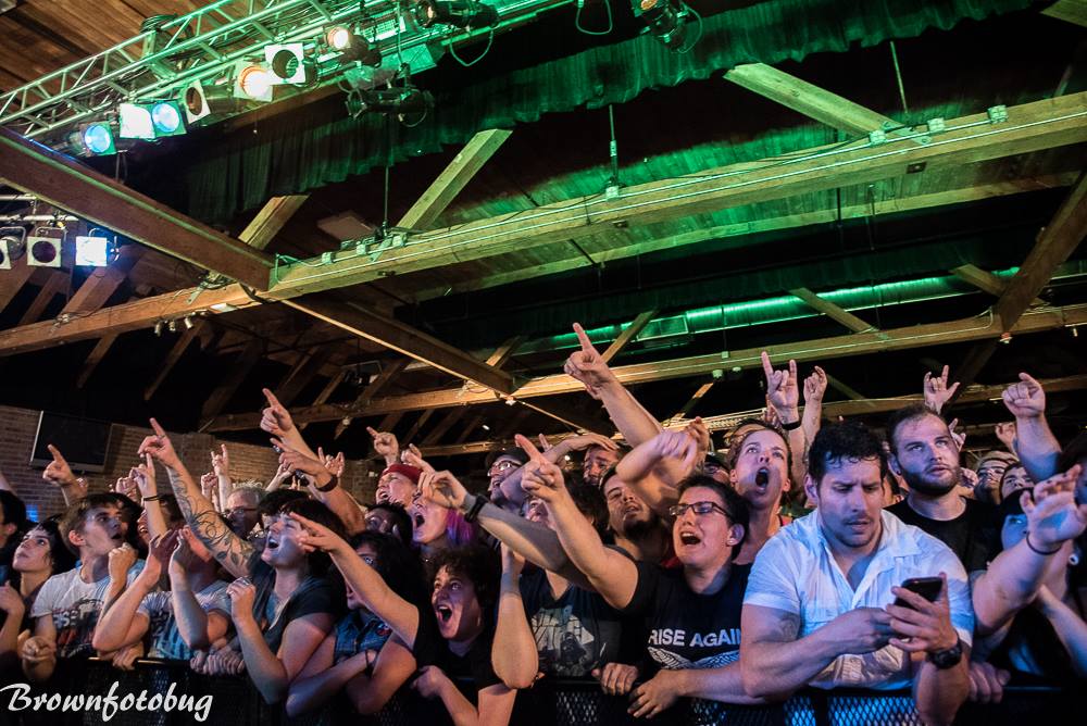 Don't be that guy (on his phone) at a recent Rise Against show. (Photo: Arlene Brown)